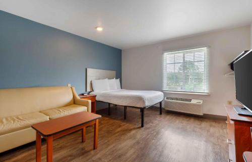 Ένα ή περισσότερα κρεβάτια σε δωμάτιο στο Extended Stay America Select Suites - Fayetteville