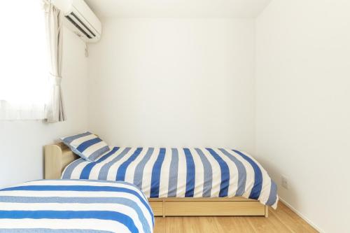 Katil atau katil-katil dalam bilik di 藤沢Home 2階