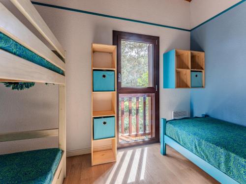 Ένα ή περισσότερα κρεβάτια σε δωμάτιο στο Maison près plage, terrasse, barbecue, Biscarrosse - FR-1-521-234