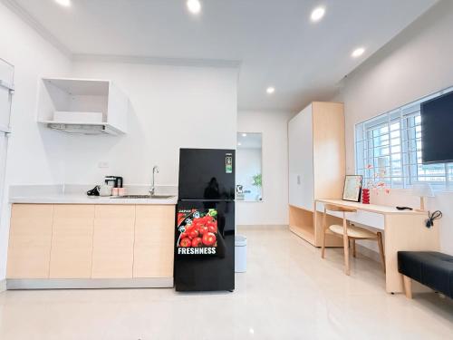 Η κουζίνα ή μικρή κουζίνα στο Sol Hotel & Apartment Phú Mỹ
