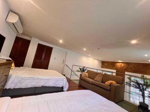 Cama o camas de una habitación en Luxury Oasis in the Old Town of Panama