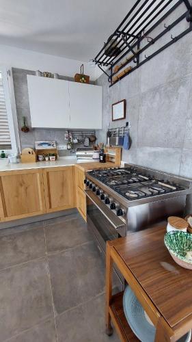 Η κουζίνα ή μικρή κουζίνα στο Casa Palombara - Healiday in Torre Salsa