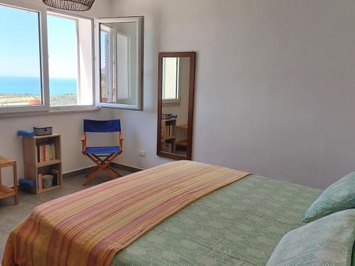 Ένα ή περισσότερα κρεβάτια σε δωμάτιο στο Casa Palombara - Healiday in Torre Salsa