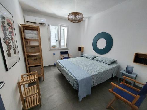 Ένα ή περισσότερα κρεβάτια σε δωμάτιο στο Casa Palombara - Healiday in Torre Salsa