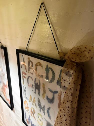 a picture of a baby sign hanging on a wall at chichinpuipui house2 in Kirishima