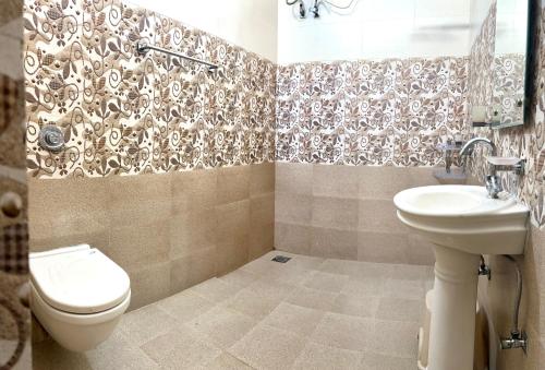 Koupelna v ubytování Bhaskar's Homestay