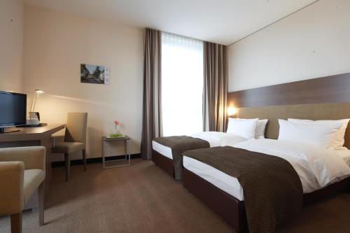 Ένα δωμάτιο στο IntercityHotel Mannheim