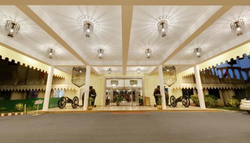 a large building with bikes parked inside of it at Ambassador Ajanta Hotel, Aurangabad in Aurangabad