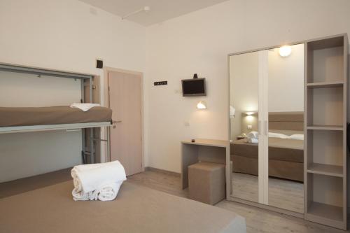 Postel nebo postele na pokoji v ubytování Hotel Lux