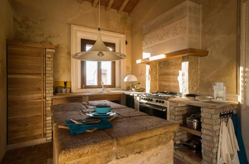Η κουζίνα ή μικρή κουζίνα στο Tuscany Forever Premium Apartments
