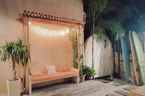 Postel nebo postele na pokoji v ubytování Meraki Siargao Resort