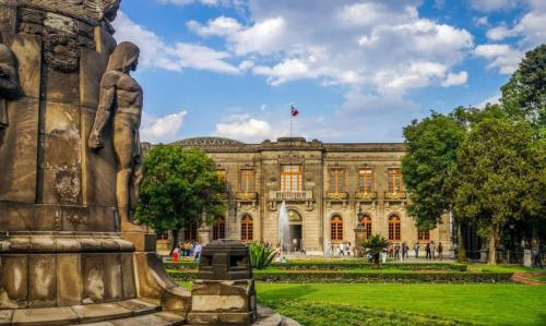 a statue of a woman in front of a building at Cute Condesa Studio Indoor Pool Nice Gym in Mexico City