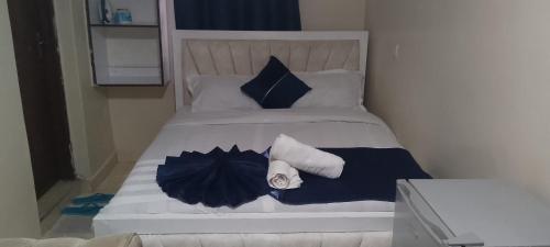 Postel nebo postele na pokoji v ubytování Utawala studio apartment