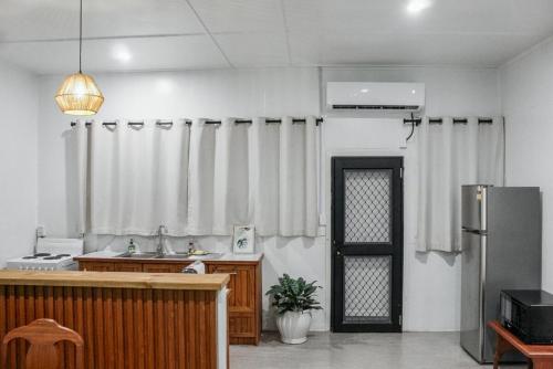 Dapur atau dapur kecil di Tiare Central 2BR Unit