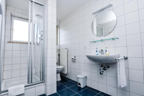 Koupelna v ubytování Hotel Garni Superior