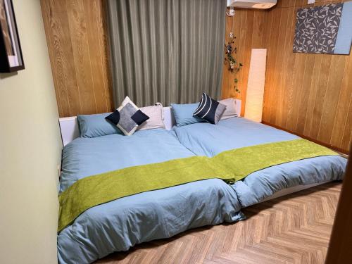 Cama o camas de una habitación en Inuyama HIDAMARI 貸切一軒家 無料P