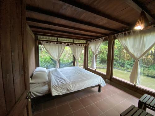 Postel nebo postele na pokoji v ubytování Nậm Cang Homestay