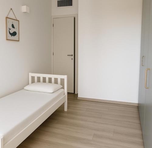 Una cama o camas en una habitación de Nàlua Sardinia Experience