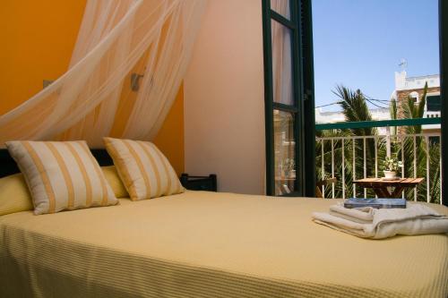 Postel nebo postele na pokoji v ubytování Hotel Naxos Beach