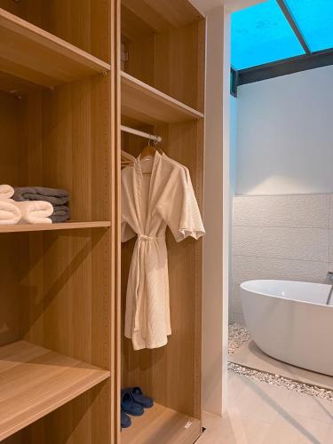 a closet with a sink and a tub in a bathroom at The X10 Nordic Tent and Glamping Pool Villa Khaoyai เขาใหญ่ - SHA Certified in Ban Thung Sawang