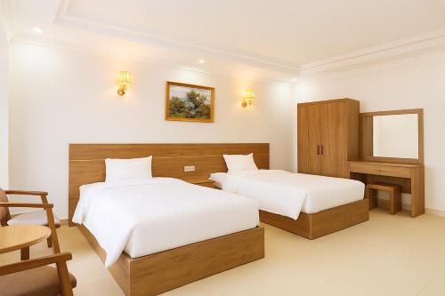 Un ou plusieurs lits dans un hébergement de l'établissement Yasumi Onsen Resort