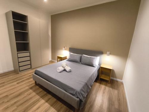 Postel nebo postele na pokoji v ubytování CasaMedì