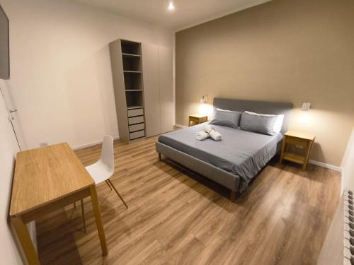 Postel nebo postele na pokoji v ubytování CasaMedì