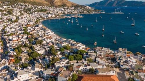 an aerial view of a city with boats in the water at Casa Roma Boutique Hotel in Bodrum City