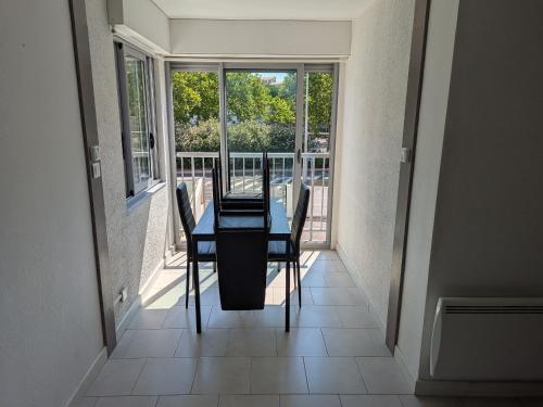 En balkon eller terrasse på Studio Port Cap d'Agde CAP3
