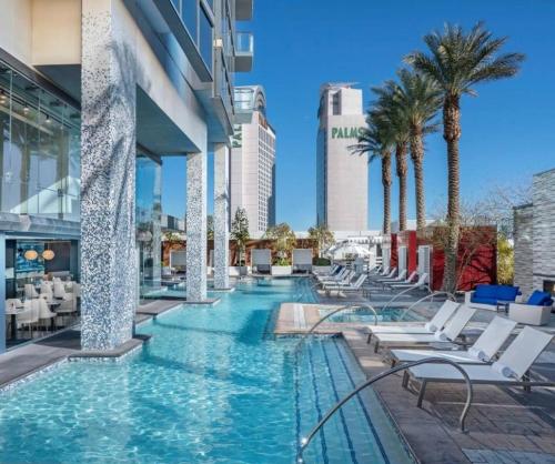 a pool at the trump hotel casino at Luxe Condo Free Parking No Resort Fees in Las Vegas