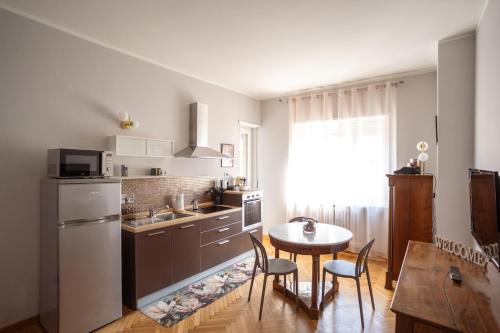 Kuchyň nebo kuchyňský kout v ubytování Balti50, lovely house in Turin