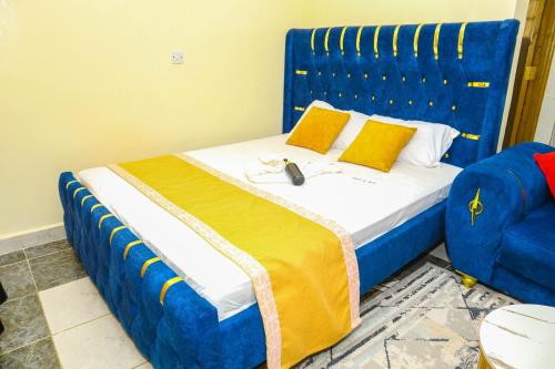 Ένα ή περισσότερα κρεβάτια σε δωμάτιο στο TRAN-quil Homes