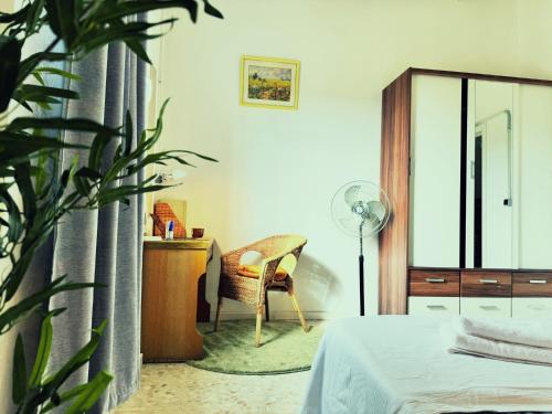 Ένα ή περισσότερα κρεβάτια σε δωμάτιο στο Olivida Farm