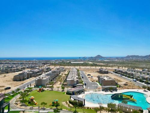 an aerial view of a resort with a pool at Vista Del Arco in Cabo San Lucas