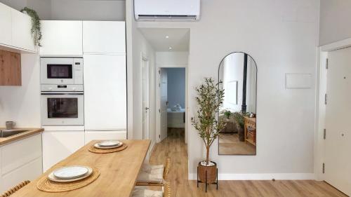 Η κουζίνα ή μικρή κουζίνα στο Aljara Suites