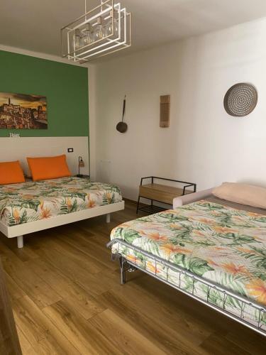 Ein Bett oder Betten in einem Zimmer der Unterkunft La Macchia sui Sassi
