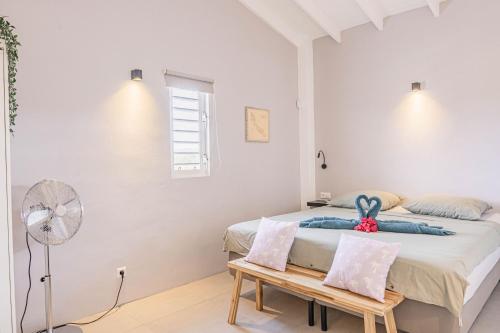 Una cama o camas en una habitación de kas Chogogo
