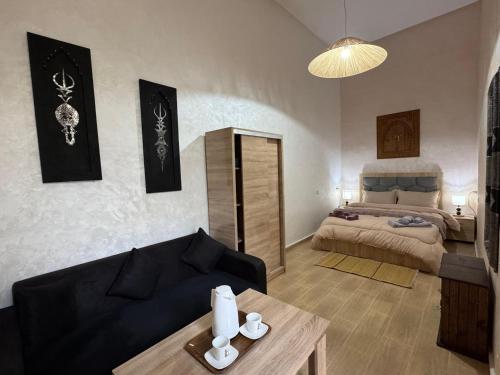 Postel nebo postele na pokoji v ubytování Riad Dar Fassi