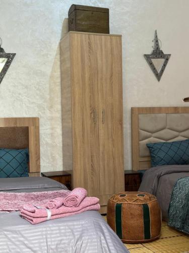 Postel nebo postele na pokoji v ubytování Riad Dar Fassi