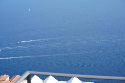 a view of the ocean from the top of a building at San Giacomo Relais in Furore