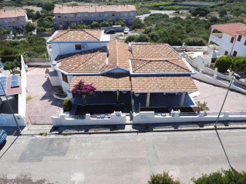 an aerial view of a house at cala di seta in Calasetta