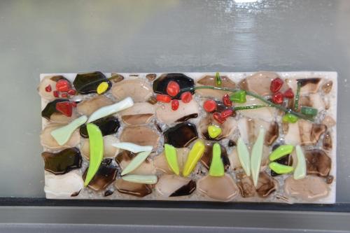 a tray of chocolate desserts with cherries on it at Artists' Colony Inn Zefat in Safed