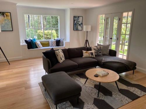 a living room with a couch and a table at Best of Yarra Valley and Kinglake National Park 