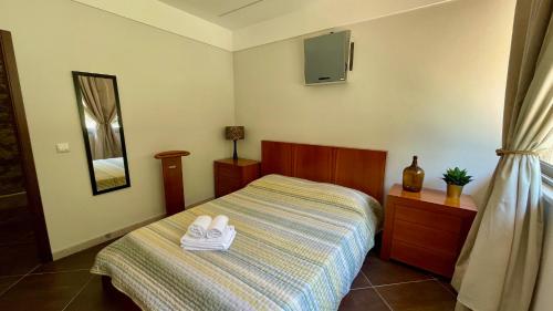 Ένα ή περισσότερα κρεβάτια σε δωμάτιο στο Quinta dos Amores