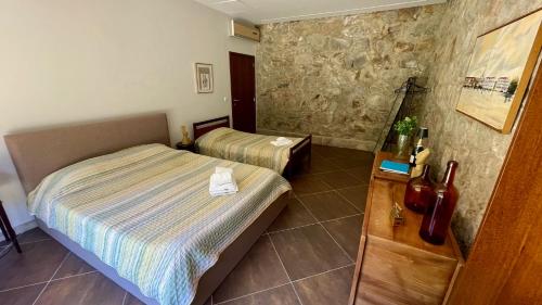 Ένα ή περισσότερα κρεβάτια σε δωμάτιο στο Quinta dos Amores