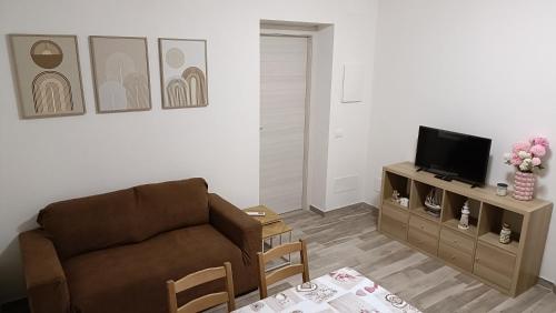 Agriturismo Fosso Tortoにあるテレビまたはエンターテインメントセンター