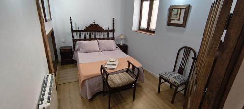 Кровать или кровати в номере Casa Rural Casona Camino Pedraza - 4 Estrellas
