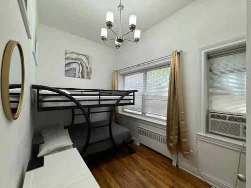 a bedroom with a bunk bed and a window at Lincoln Center New York in New York