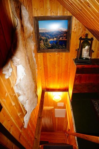 Televisyen dan/atau pusat hiburan di Bergheim Schmidt, Almhütten im Wald Appartments an der Piste Alpine Huts in Forrest Appartments near Slope