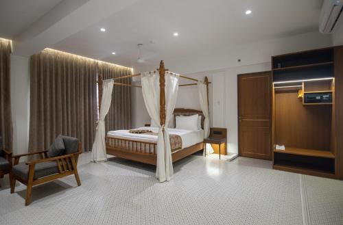 Postel nebo postele na pokoji v ubytování Haldi Kumkum Resort